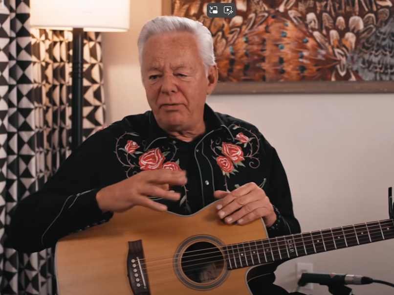 Tommy Emmanuel with Andy Allen built Maton guitar